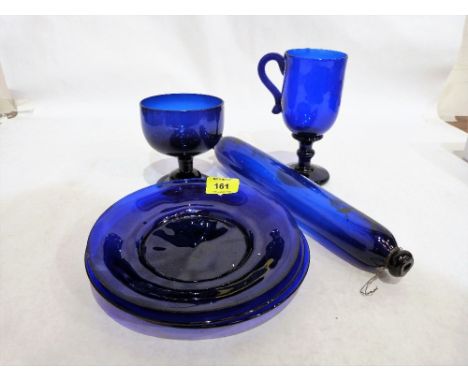 Bristol blue glass to comprise a rolling pin, three plates, mug on knopped stem and a bowl