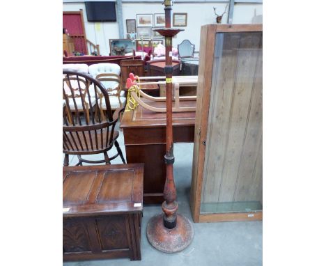 A 1920's red japanned lamp standard