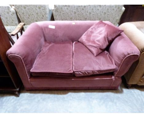 A 1930's drop-end chesterfield sofa upholstered in pink dralon. 53'' wide