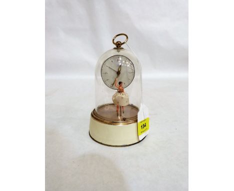 A 1950's German alarm clock under a dome with musical ballerina automaton. 6'' high