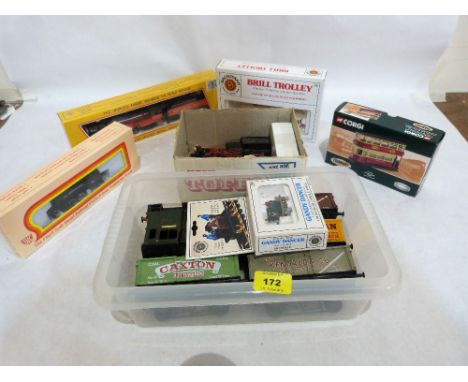 A collection of model railway locomotives and rolling stock. Various gauges