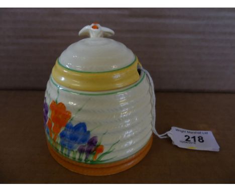 A Clarice Cliff Newport Pottery Beehive honey pot, decorated in the 'Crocus' pattern, factory marks to base, height 10cm