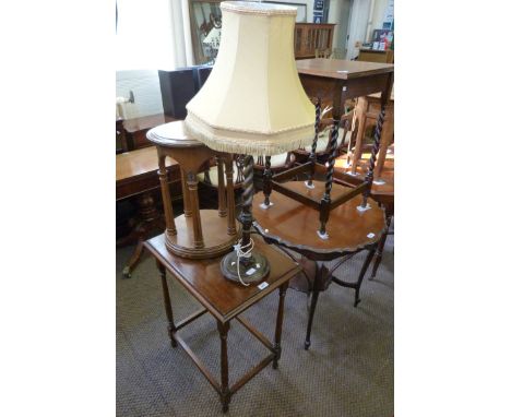 Two early 20th Century oak side tables, one raised on barleytwist supports together with a similar barleytwist table lamp and