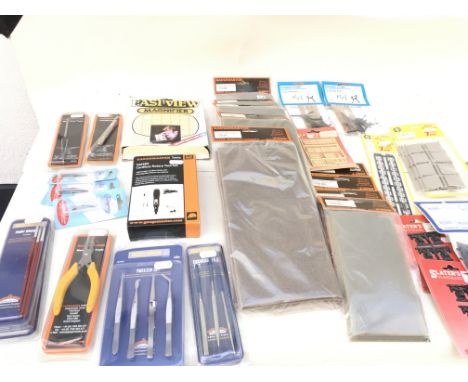 A selection of new and unopened modelling tools also a variety of accessories for creating model railway scenes. No reserve