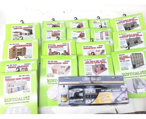 A collection of Metcalfe Card Construction Kits all unopened. Includes small factory..industrial units and department store p