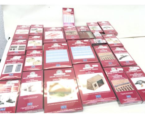 A collection of 25 new unopened PECO scenic series models in 00 scale for creating model railway layouts. No reserve