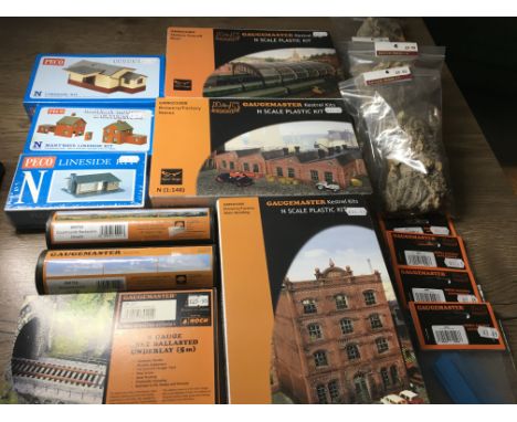 A collection in excess of 15 pieces of model railway accessories by PECO ..Gaugemaster . Includes buildings and scenes etc al
