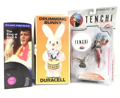 A Boxed Elvis Bobblehead. A Duracell Drumming Bunny and a McFarlane Toys Tenchi Muyo. (3).