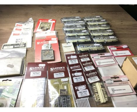 A collection in excess of 30 new unopened accessories for model railway N scale. Manufacturers include Bachmann..Slaters plus
