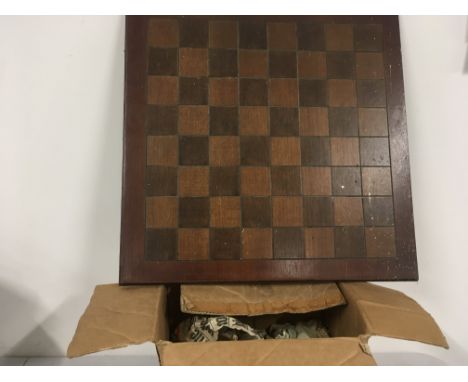 A wooden chess board with medieval resin pieces. Also a collection of 14 Cherished Teddies ornaments. No reserve. (2)