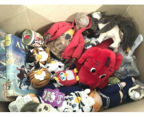 A box containing an assortment of toys including furbys..Star Wars..Disney chess set, chitty Chitty bang bang collectors edit
