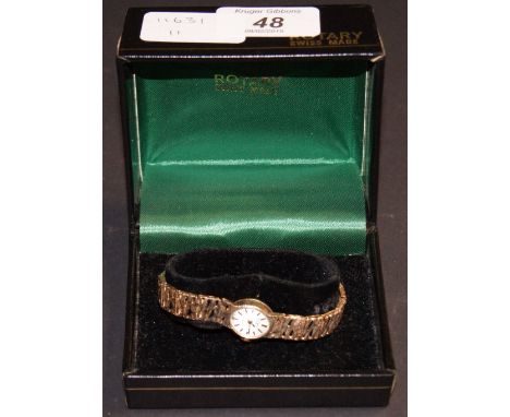 Boxed 9ct yellow gold Rotary ladies' wristwatch, on a gold pierced bark-effect bracelet CONDITION REPORT; The total approxima