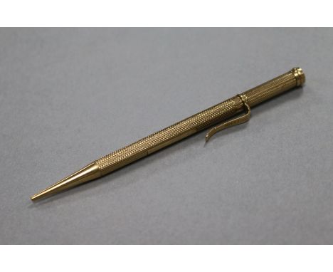 A 1920's engine turned 9ct gold propelling pencil by Sampson Mordan & Co, 11.2cm.