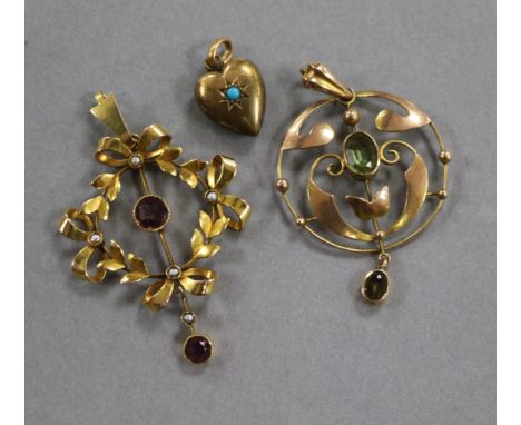 An Edwardian gold openwork pendant set amethyst and pearl, a peridot set pendant and a 15ct gold and turquoise heart pendant