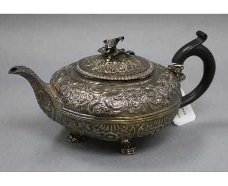 A George III embossed silver teapot, by William Burwash, London 1817