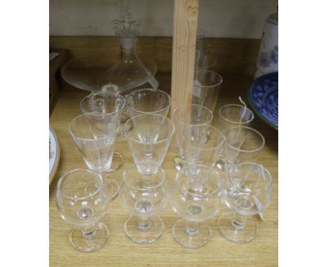 A collection of Glassworks London Ltd table glassware, including a 'ship's' decanter with fleur-de-lys style palmette stopper