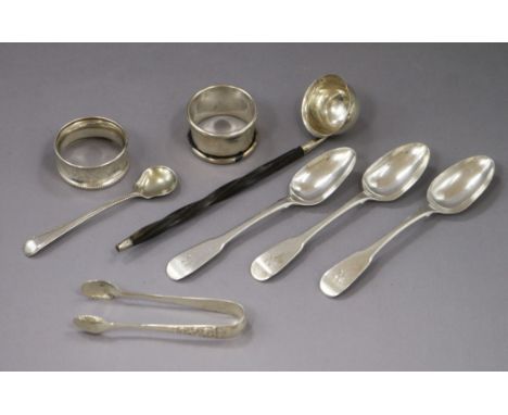 A group of small silver including two serviette rings, salt spoon, a pair of sugar tongs, a silver toddy ladle and three teas