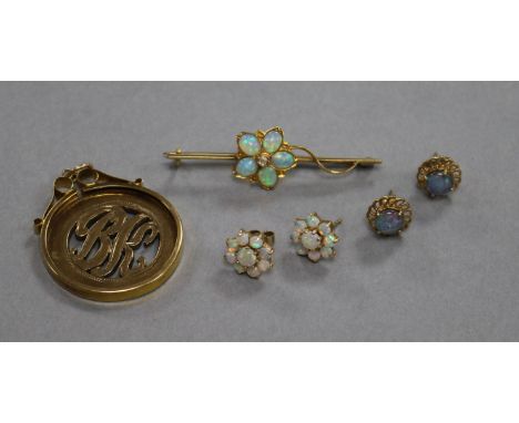 A 9ct gold and white opal bar brooch, a 9ct gold pendant and two pairs of ear studs.