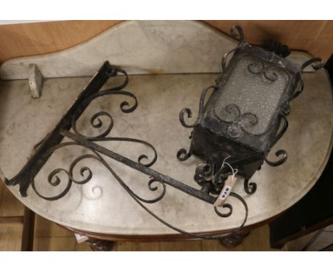 A wrought iron lantern W.22cm