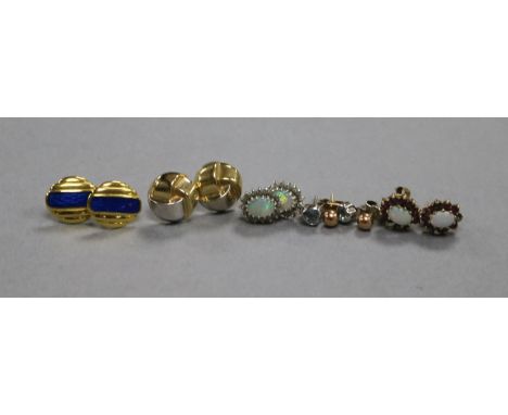 A pair of 18ct gold and blue enamel ear studs, one other 18ct gold pair of ear studs and four pairs of assorted 9ct gold ear 