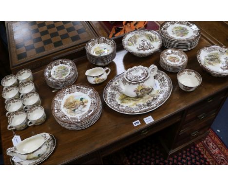 A Royal Worcester Palissy Games Series part dinner and tea service, comprising 8 dinner plates, 8 dessert plates, 8 soup bowl