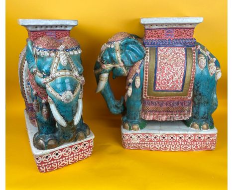 ELEPHANT STOOLS, a pair, in the manner of Thomas Goode, hand painted ceramic, each with seal mark to base. 55cm H x 55cm W x 