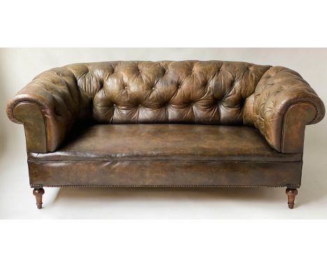 CHESTERFIELD SOFA, Victorian button leather and horse hair upholstered with curved back and arms on turned supports, 180cm W.