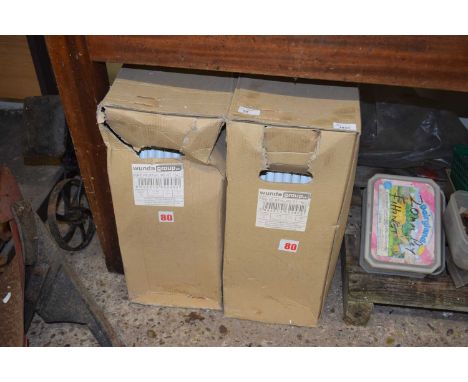 Two boxes of PVC plumbing pipe
