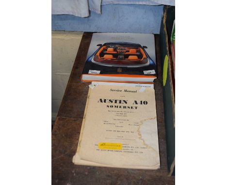 A Rolls Royce Enthusiast Club instruction manual together with an Austin A40 service manual