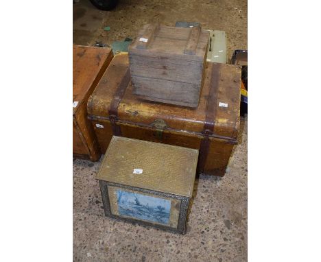 A vintage tin travelling trunk together with two other boxes