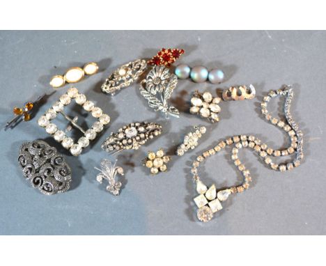 A Christian Dior Mother of Pearl Set Bar Brooch together with a small collection of paste set and marcasite brooches and a pa