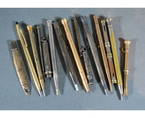 A Silver Cased Propelling Pencil together with a collection of other propelling pencils and pens 