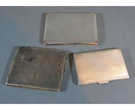 A Birmingham Silver and Gold Mounted Cigarette Case with engine turned decoration together with another similar 925 silver ci
