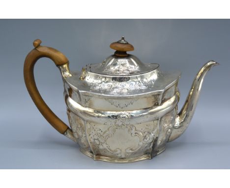 A George III Silver Teapot of foliate and scroll embossed form, London 1801, maker Daniel Pontifex, 15 ozs. 