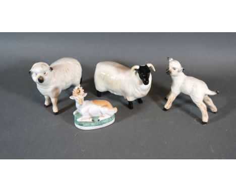 A Beswick Model Of A Ram together with two Beswick sheep and a small model of a deer 