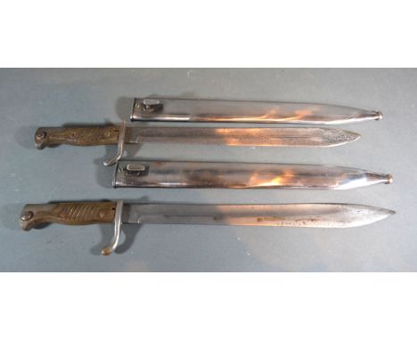 Two First World War German G98 Bayonets with metal scabbards 50 cms long 