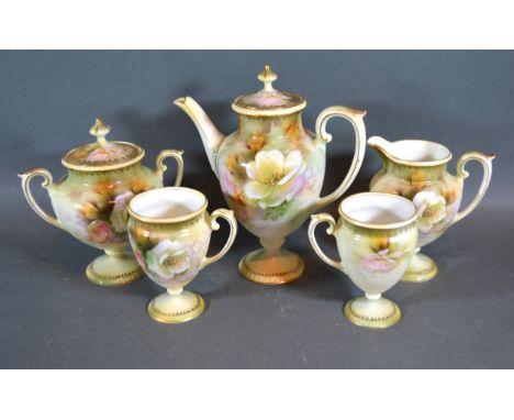 An RS Poland China Tea service comprising teapot, cream jug, sucrier and two cups all decorated with flowers upon a blush ivo