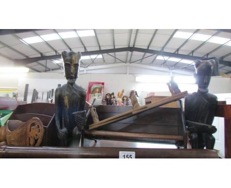 A shelf of wooden items.