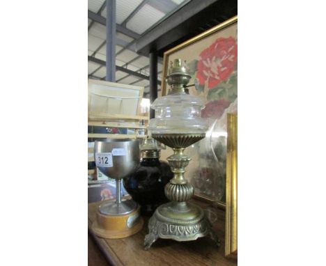 2 oil lamps and a goblet. ****Condition report**** Base in good condition, burner collar on font is split.The Font is undamag