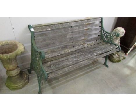 A cast iron and wood bench (needs some slats replacing).