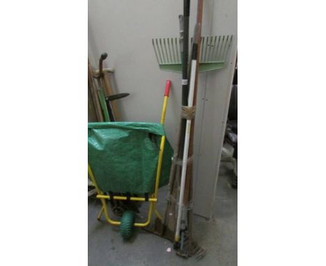 A good lot of garden tools including collapsible wheelbarrow, axe etc.,