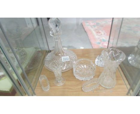 A cut glass ships decanter and 6 other cut glass items.