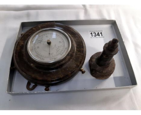 A Cornish seprentine ships wheel barometer and a lighthouse