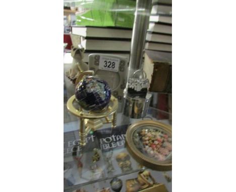 A mixed lot including small globe, photo frame, trinket box etc.,