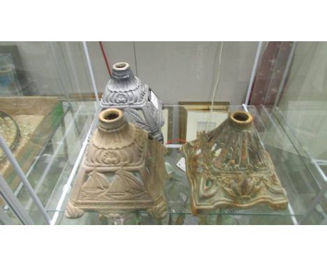 3 early 20th century cast iron oil lamp bases.