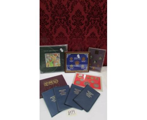 A collection of coin sets including 4 Britain's first decimal coins, old pennies, 1970's etc., (9 sets).
