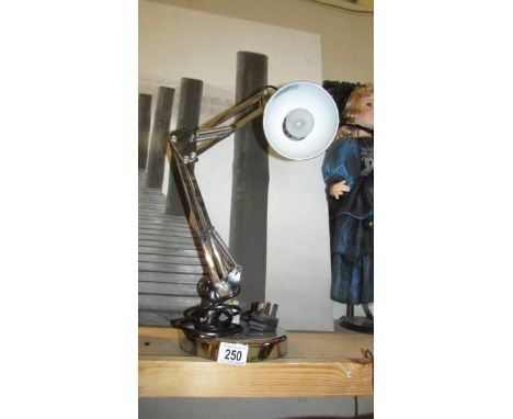 A chrome anglepoise lamp.