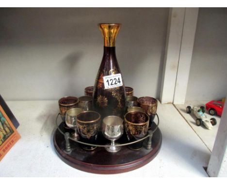 A gilded glass drinks set on tray, decanter has no stopper