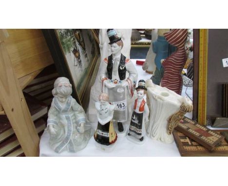5 assorted ceramic figures.
