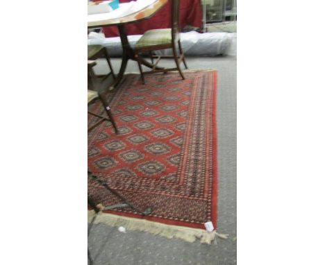 A red patterned rug.